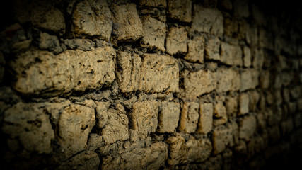 old wall made with adobe bricks