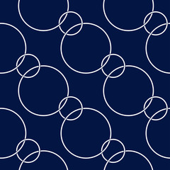Geometric seamless pattern. White round design on dark blue background