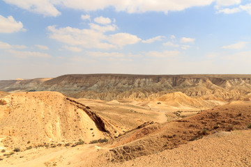 Negev desert mountain panorama with hiking group, Israel