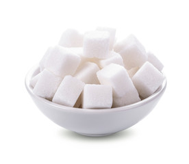 Sugar cubes in a bowl isolated on white background