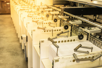 Paper sheet sorting machine in a printing press