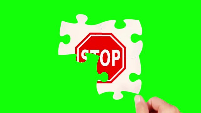 Hands solving a puzzle. 4 videos in one file. Female and male hands solving a stop sign puzzle. Two backgrounds green screen and wood. More options in my portfolio.   