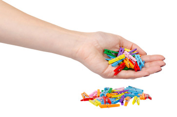 Mini colored clothespins, decoration. Isolated on white.