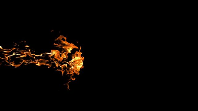 Slow motion shot of fire blowing out across screen