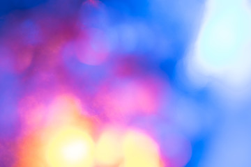 Abstract bright blured colored bokeh. Lights of the night city background.