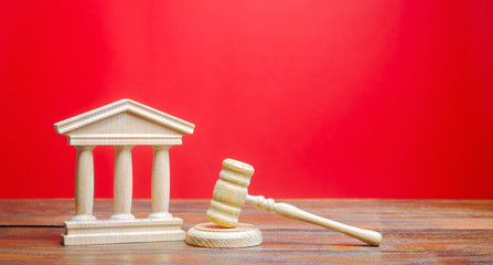 Courthouse and gavel. International Court. Protection of business interests and human rights....