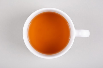 Tea cup composition on gray background. Flat lay.