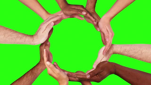 Hands in a circle. Multiracial female and male hands making a circle. Teamwork. Green screen. Loopable from frame 111 to frame 605. More options in my portfolio.    