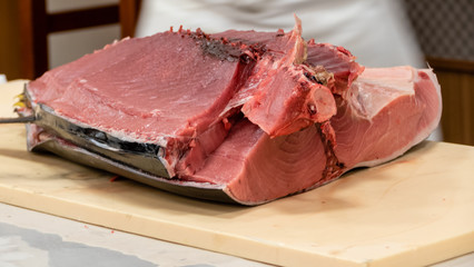 Chef preparing tuna sashimi