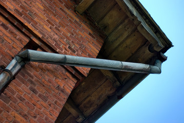 Detail of the historical building - former train station. Authentic masonry brickwall, doors and other architectural details.