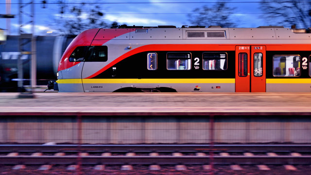 Passenger train at the station. Koluszki, Poland.