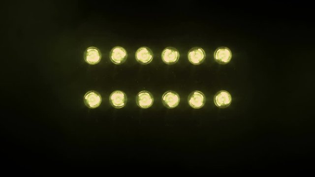 Stage lights. Floodlights shining brightly and turning on and off. Green. More color options in my portfolio.
