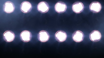 Stage lights. Square. Amber-Blue. Close-up. Floodlights shining brightly and turning on and off. More options in my portfolio.         - Powered by Adobe