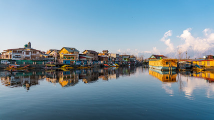 View of  Dal lake  and boat house before sunset in the heart of Srinagar during winter  , Srinagar...