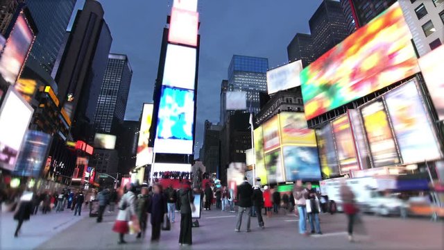 View from Times Square at night. Time lapsed. 2 videos in 1 file.  All the screen videos were removed and replaced. Blurred faces. More options in my portfolio.