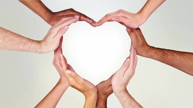 Diversity and inclusion as a Heart shape made from diverse multicultural  hands as a group of different people hands connected together shaped as a  symbol of social unity Photos