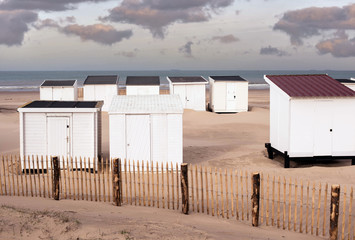 Fototapeta na wymiar sunset over the beach huts in the north of France