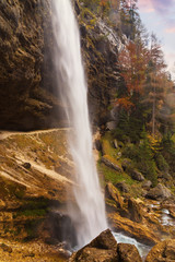 Beautiful and powerful Pericnik waterfall in Slovenia in autumn