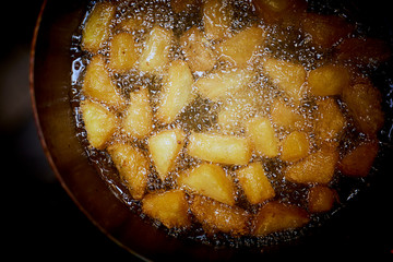 Tofu fritters in hot oil