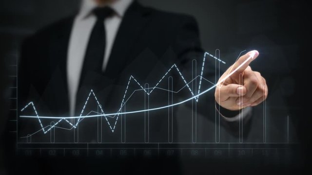 Businessman drawing an ascending financial chart. Touchscreen. 2 colors in 1 file. Blue and green. Businessman drawing a bright arrow showing increasing profits in a financial chart. Business success.