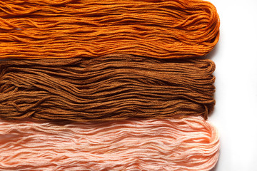 The color combination is brown. Colored threads.