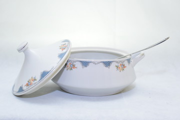 Mock up / design set of elegant and traditional  colorful white and blue dishware and dork knife spoon  , design/ dining-ware and food plates and bowl isolated on white background