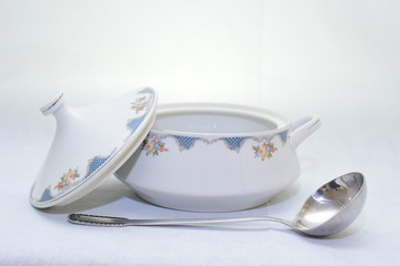 Mock up / design set of elegant and traditional  colorful white and blue dishware and dork knife spoon  , design/ dining-ware and food plates and bowl isolated on white background
