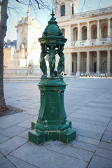 Obraz premium Fountain for drinking water in the form of a gazebo by three female figures. Traditional decoration of Paris in the Art Nouveau style, France.