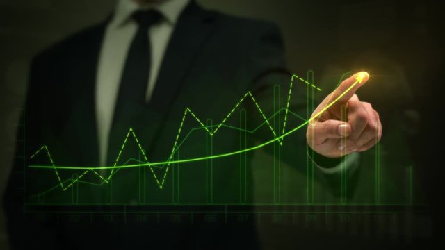 Businessman drawing an ascending financial chart. Touchscreen. Green and Red. 2 colors in 1 file.  Businessman drawing a bright arrow showing increasing profits in a financial chart. Business success.