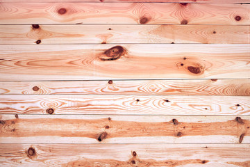 Fototapeta premium Beautiful wooden background from pine boards with knots.