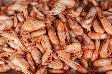 Tasty fresh shrimps as background. Top view.