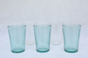 Mockup and design set of blue and transparent water glass.  template for branding identity and company logo design/ drink-ware, Dining and isolated on white background