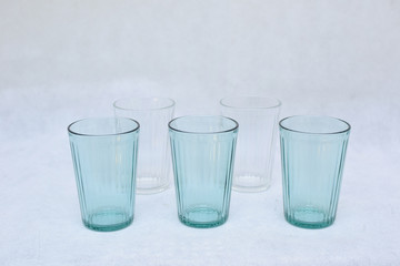 Mockup and design set of blue and transparent water glass.  template for branding identity and company logo design/ drink-ware, Dining and isolated on white background