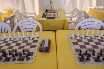 Chess tournament. An empty room with chess boards before the start of the game