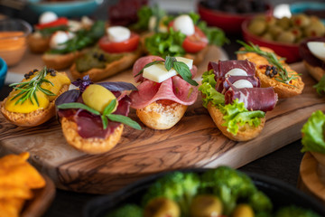 Many kinds of appetizer on the black table