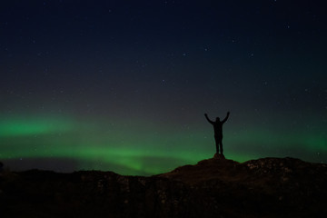 Naklejka na ściany i meble Aurora borealis also known as a northern lights over Iceland