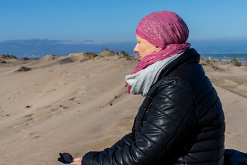 woman with pink headscarf