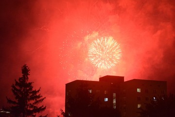 red fireworks over the city