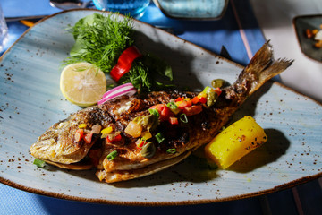 photo taken of beautiful and yummy cooked white fish at restaurant