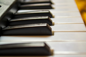 Fototapeta na wymiar musician plays the piano, selective focus with shallow depth of field.
