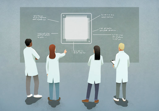 Scientists discussing computer chip diagram