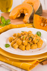 Pumpkin gnocchi with grated amaretti cookies.