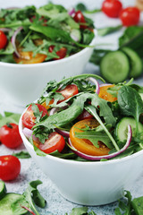 A bowl full of vegetable salad