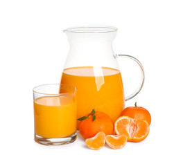 Jug and glass of tangerine juice with fruits isolated on white