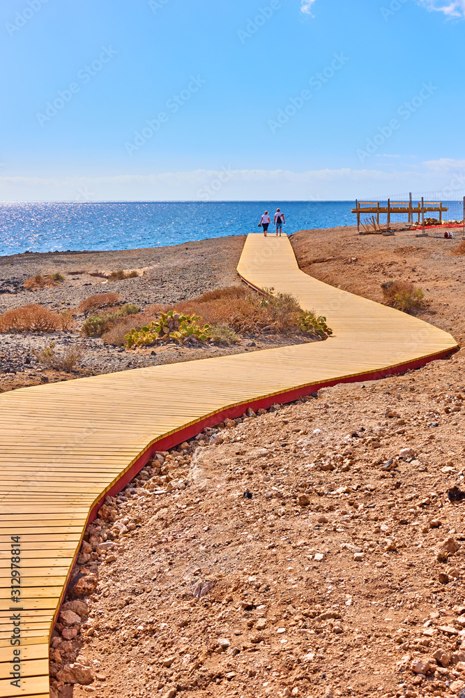 Poster Wooden footpath near The Atlantic Ocean in Tenerife