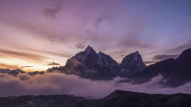 Taboche and Cholatse Mountains at Sunset. Himalaya, Nepal. Timelapse