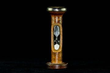 Hourglass with black background