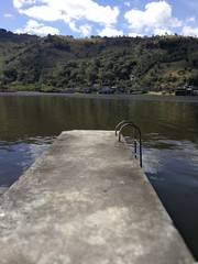 dock view with mountains in the background