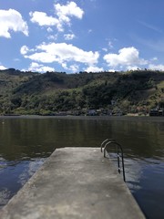 dock view with mountains in the background