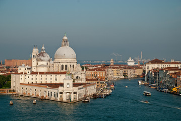 Fototapeta na wymiar Venice, Italy: Basilica di Santa Maria della Salute und Punta della Dogana, Grand Canal. In the morning sun